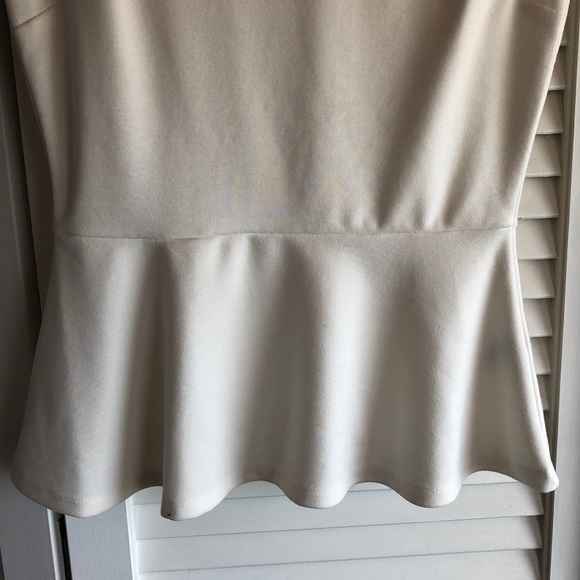 The Limited (XS) Peplum Top - Picture 7 of 8